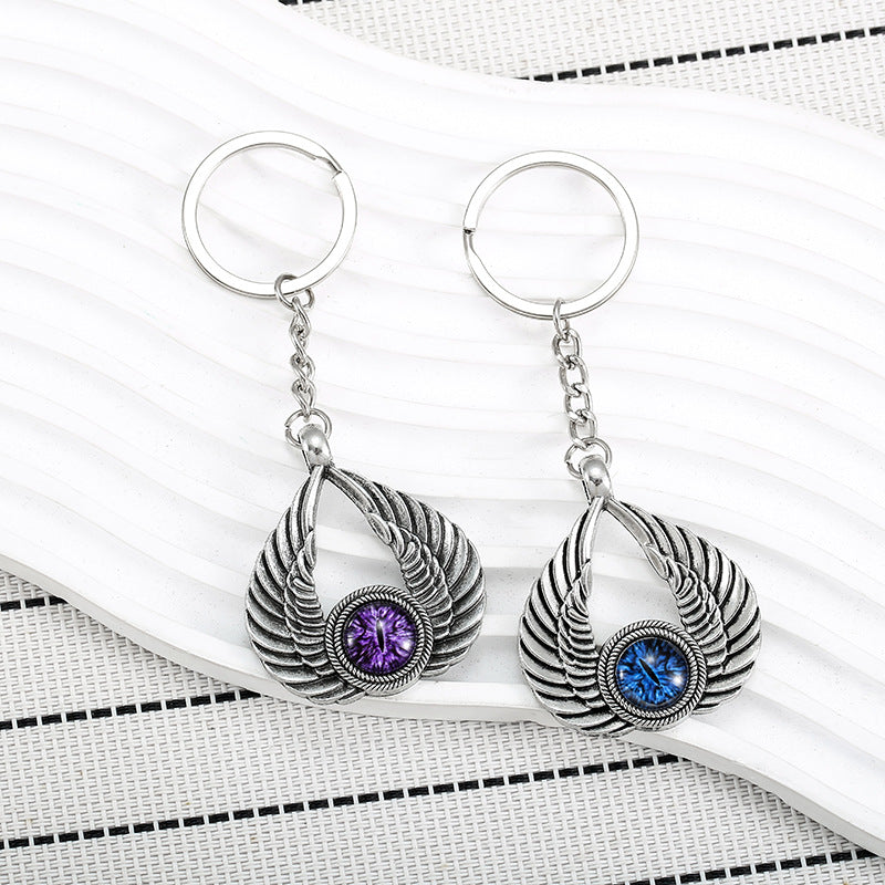 Wholesale Angel Wings Demon Eyes Zinc Alloy Keychain